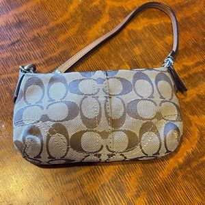 Coach monogram brown pouch bag